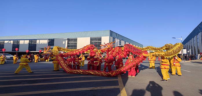 Shengxin new material dragon dance celebration started